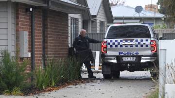 Police outside the house in Wendouree. Picture by Lachlan Bence